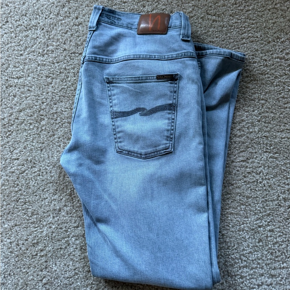 Nudie Jeans Co Thin Finn in Pale Lead grey color wash.